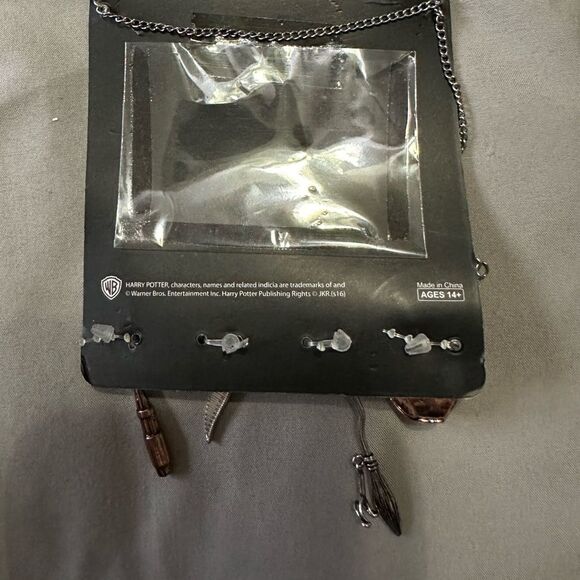 Harry Potter Multi charm Quidditch Necklace NWT - Picture 2 of 2